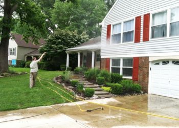 Pressure-washing-a-home