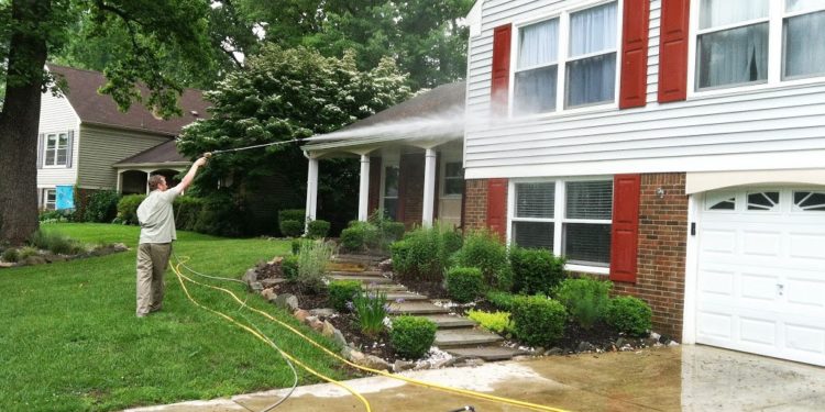 Pressure-washing-a-home